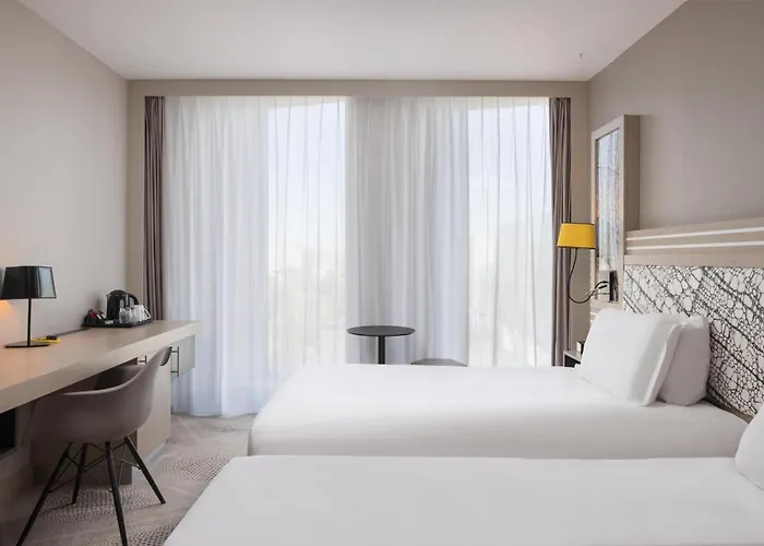 Hilton Garden Centre Hotell 4*